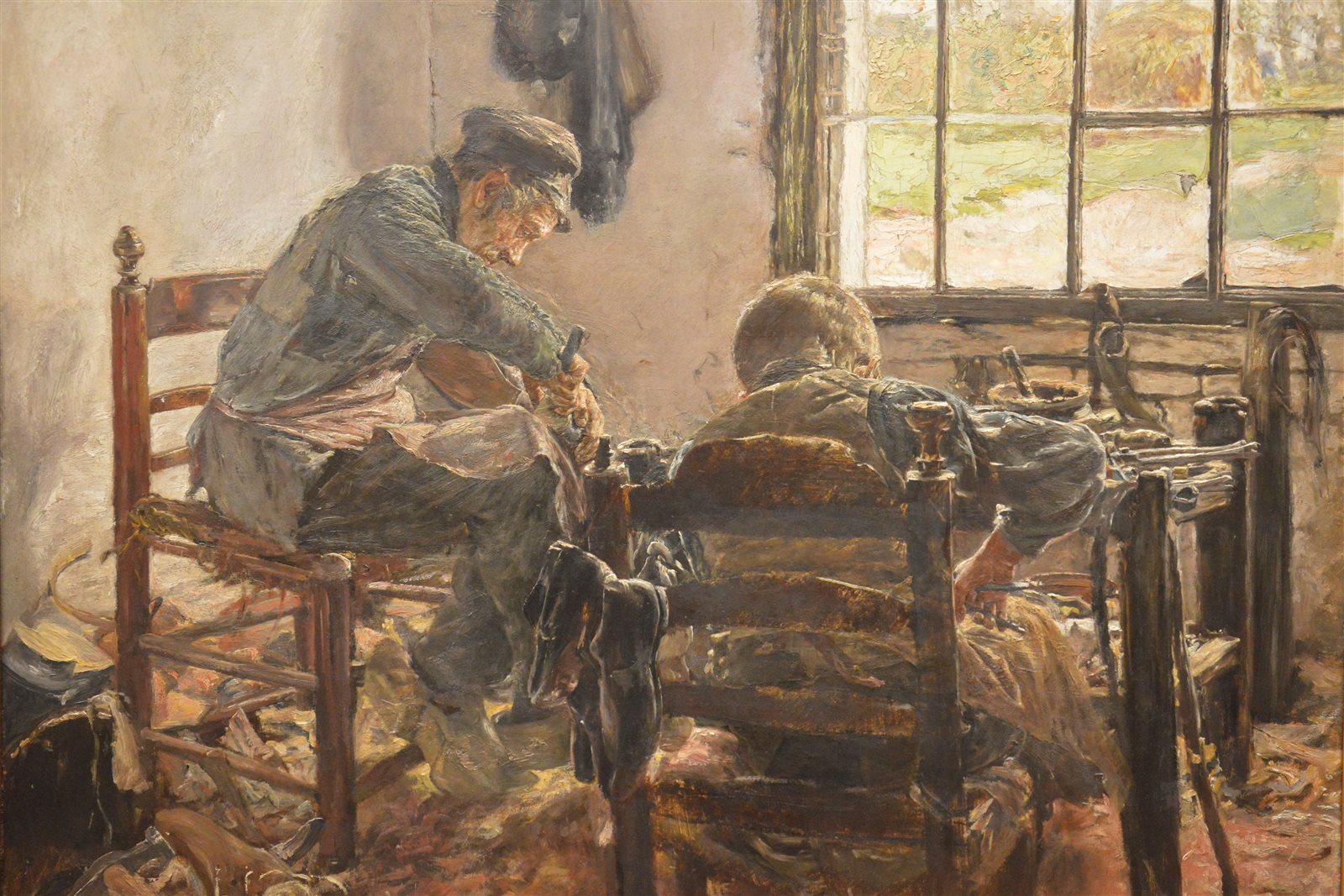 Max Liebermann painting of a cobbler workshop, a shoemaker at his bench.
